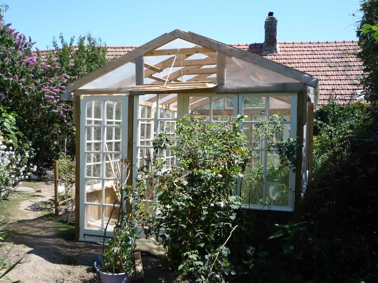 Large-Scale Recycled Window Greenhouse